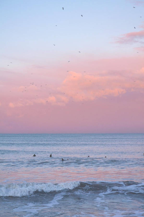 Aesthetic Pink Iphone Ocean And Sky Wallpaper
