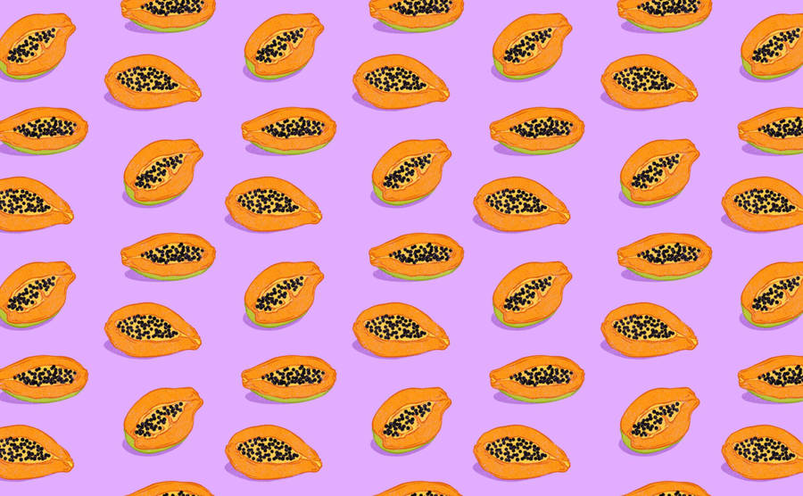 Aesthetic Sliced Papaya Fruits Purple Background Wallpaper