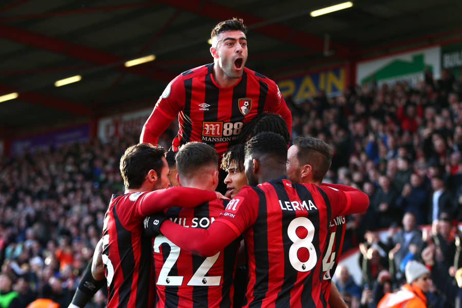 Afc Bournemouth Football Players Tight Huddle Wallpaper