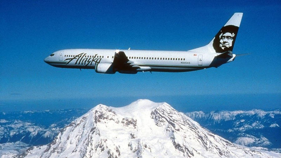 Alaska Airlines Above Mountain Peak Wallpaper