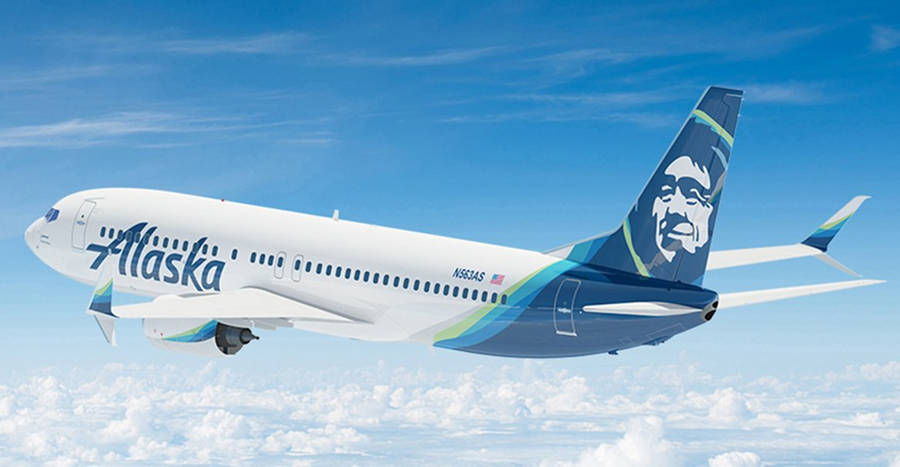 Alaska Airlines Plane In Bright Skies Wallpaper