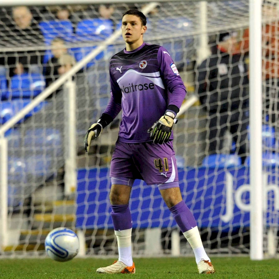 Alex Mccarthy In Purple Jersey Wallpaper