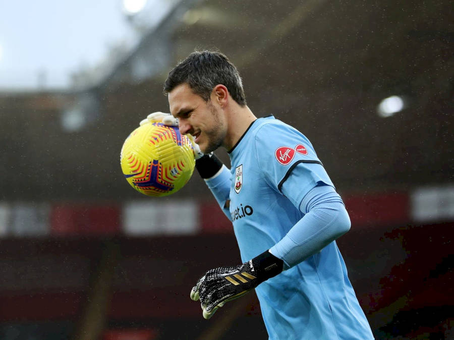 Alex Mccarthy Throws A Soccer Ball Wallpaper