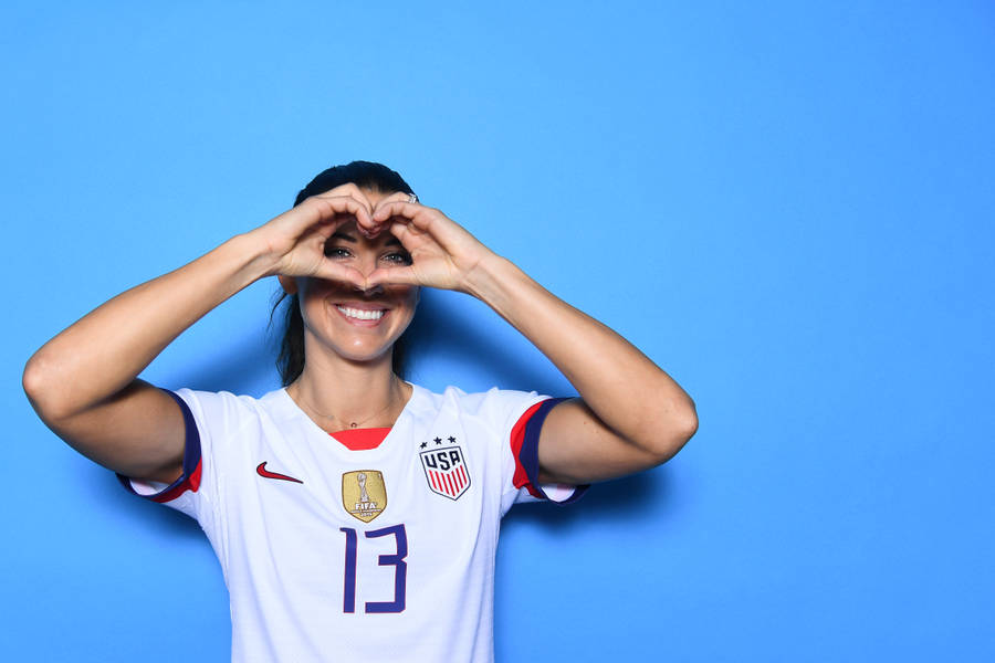 Alex Morgan Heart Pose Wallpaper