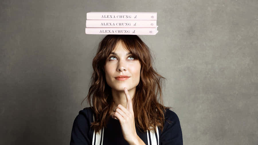 Alexa Chung Thoughtful Pose Wallpaper