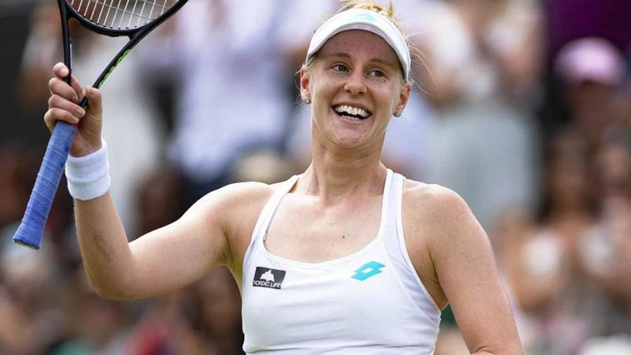 Alison Riske-amritraj Smiling With Raised Racket Wallpaper