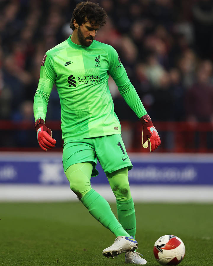 Alisson Becker Kicking Ball Wallpaper