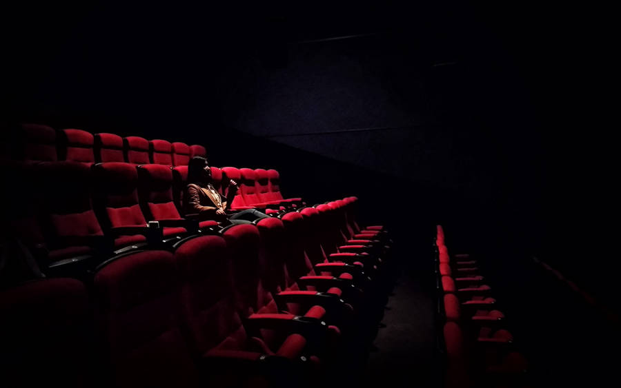 Alone In A Theater Wallpaper