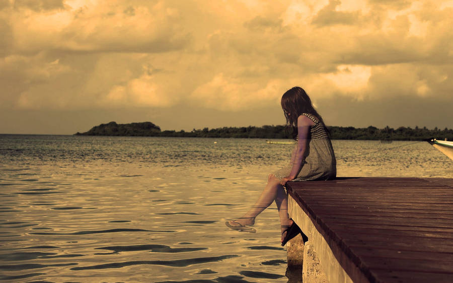 Alone On A Wooden Dock Wallpaper