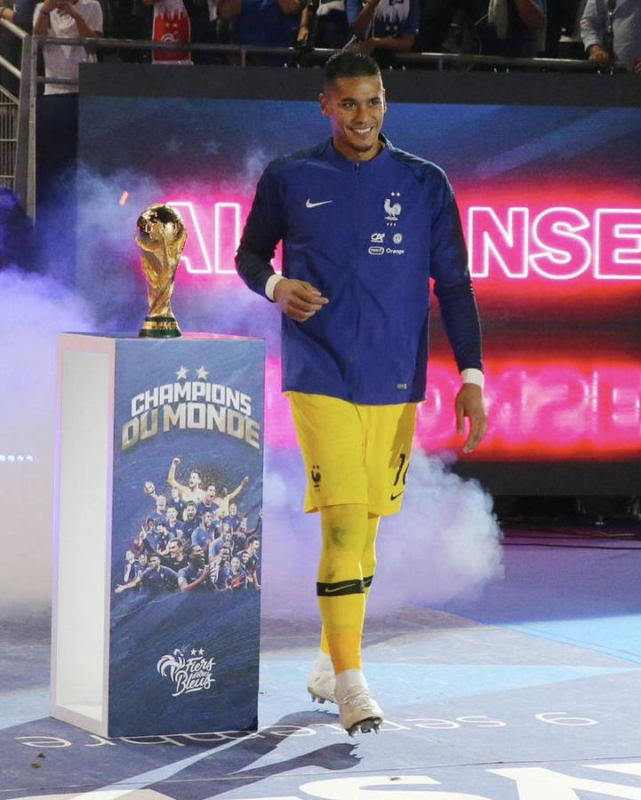 Alphonse Areola Standing Beside Trophy Wallpaper