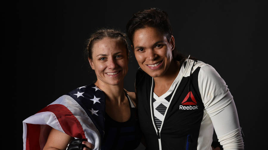 Amanda Nunes With Nina Ansaroff Wallpaper