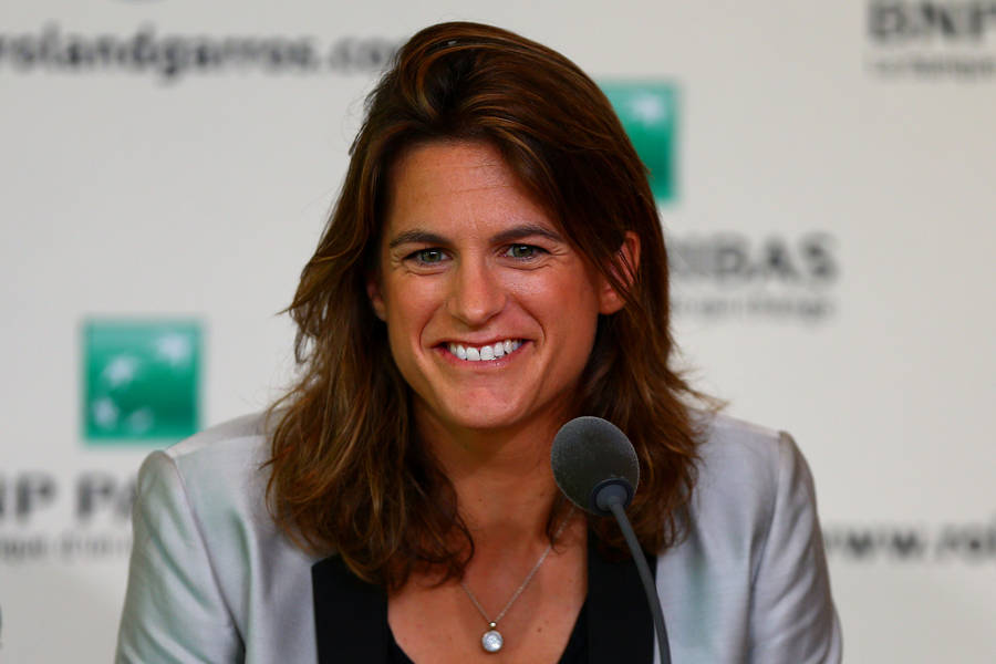 Amélie Mauresmo At A Press Conference Wallpaper