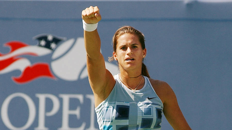 Amélie Mauresmo In Action At The Us Open Wallpaper