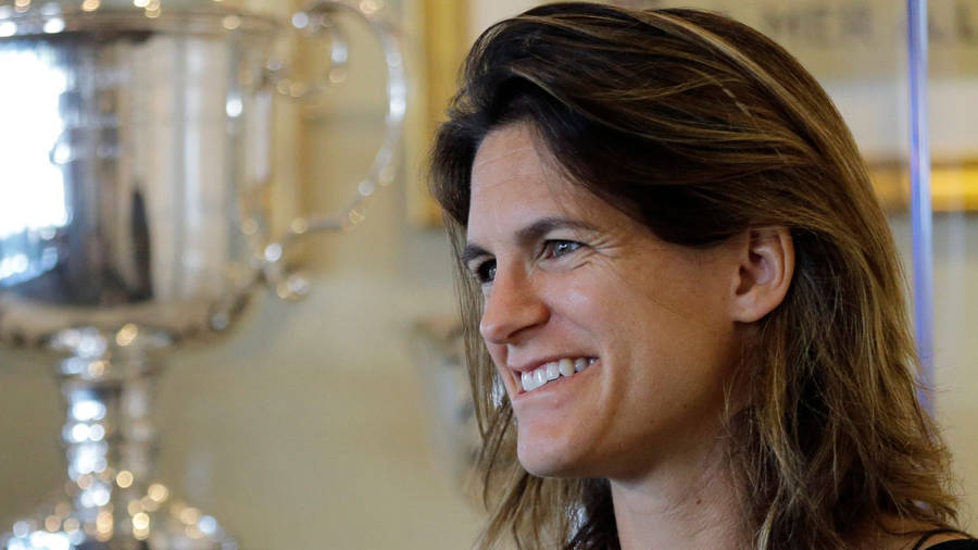 Amélie Mauresmo With Trophy Wallpaper