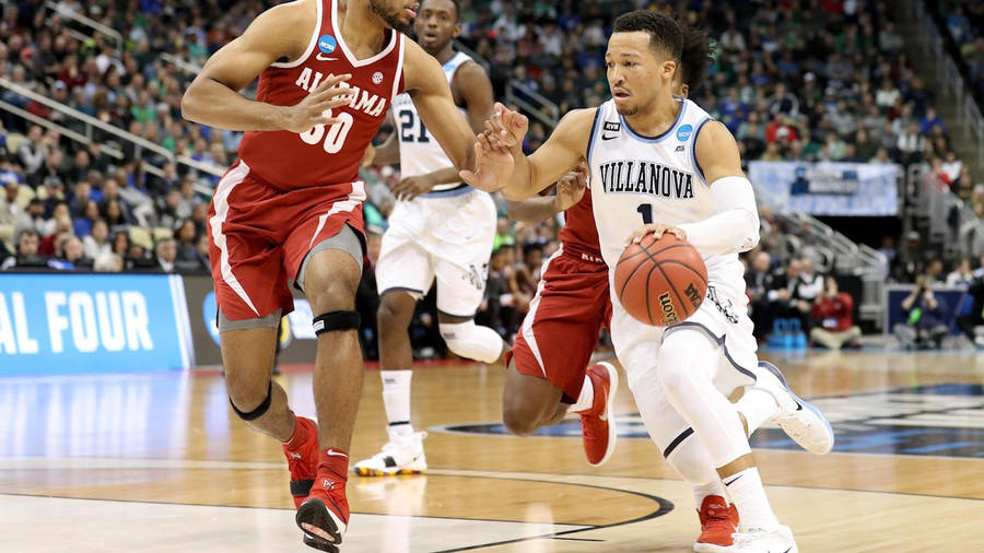 American Basketball Player Jalen Brunson Dribbles Wallpaper