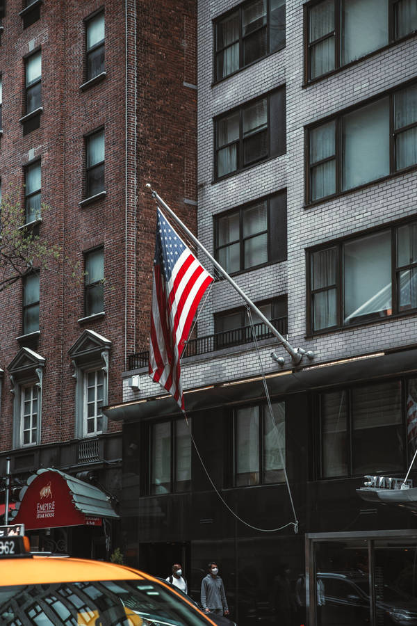 American Flag Iphone Hanging From Building Wallpaper