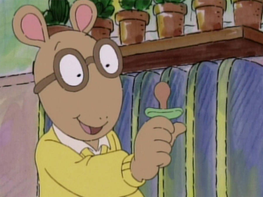 Amusing Arthur Read With A Baby Pacifier Wallpaper