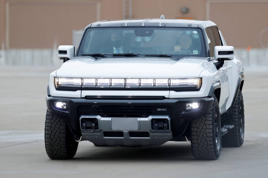 An Excellent Hummer Pickup Truck With White Headlights. Wallpaper