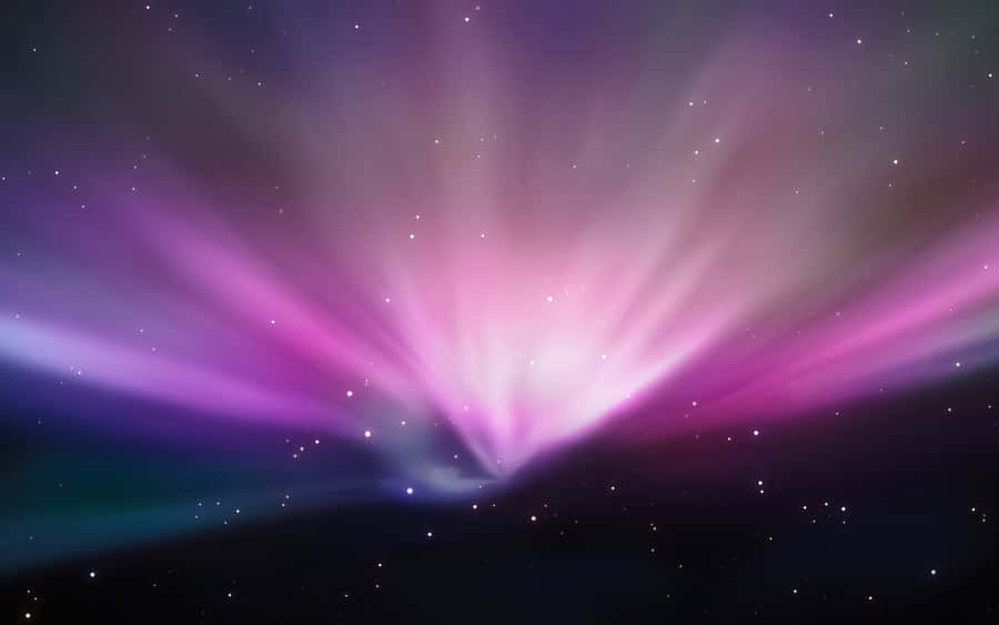 An Image Of A Purple Starburst In Space Wallpaper