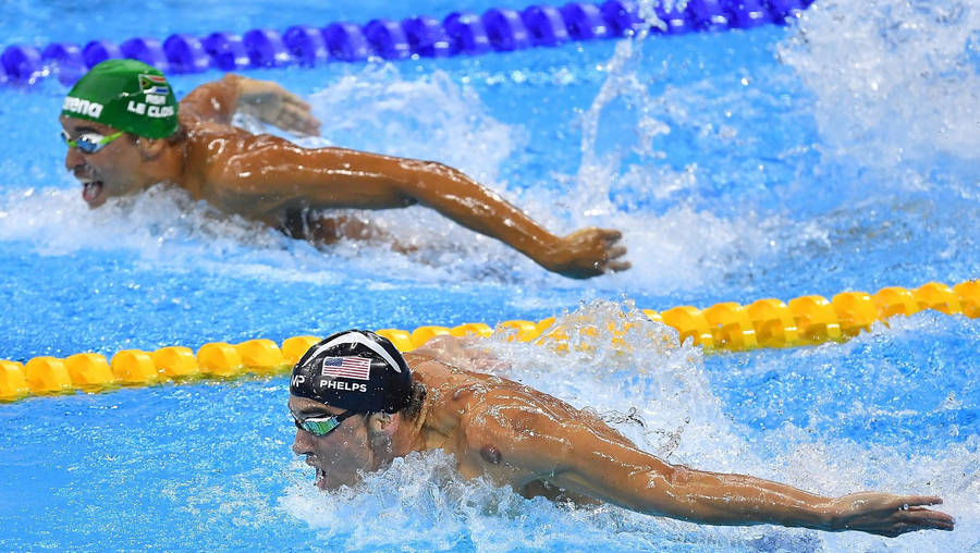 An Intense Moment Of Competitive Showdown At The Olympics Wallpaper