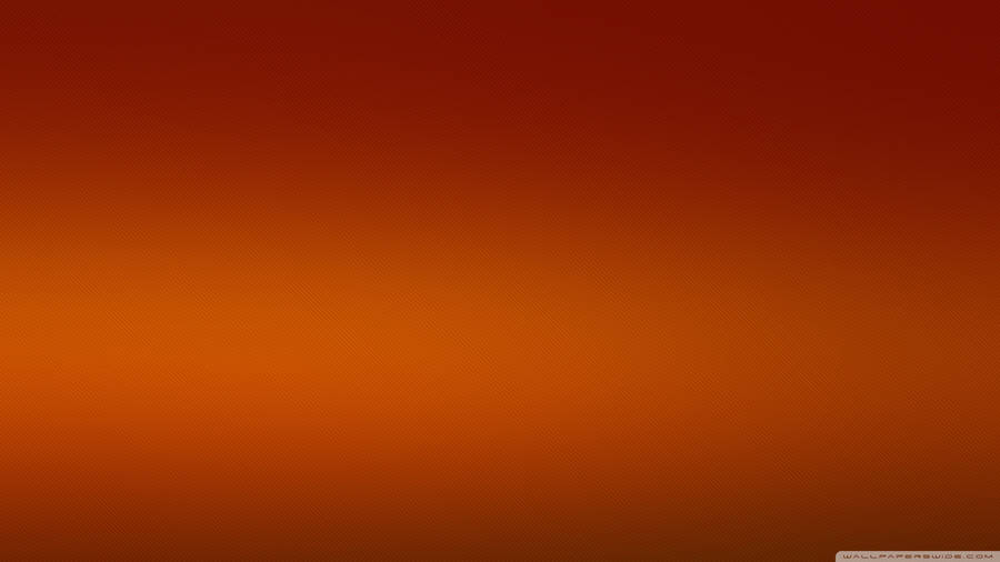 An Orange And Brown Background With A Light Wallpaper