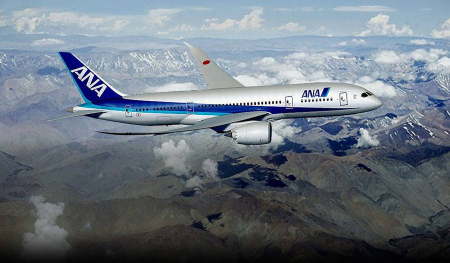 Ana Plane Above The Mountains Wallpaper