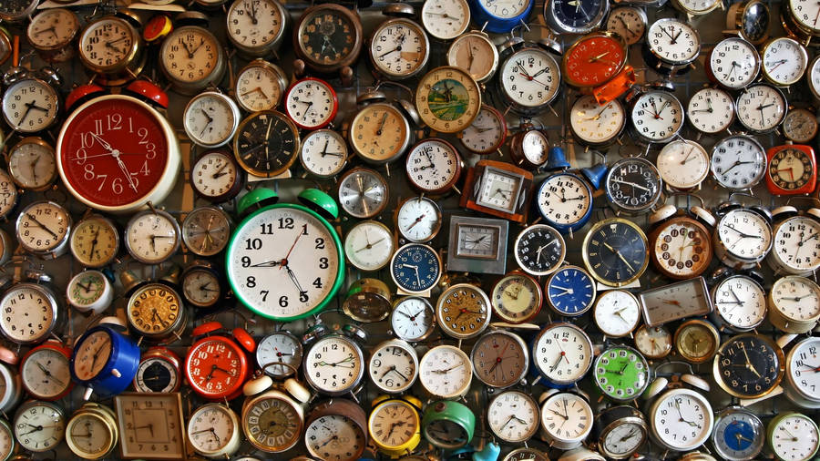 Analog Alarm Clock On A Table Wallpaper