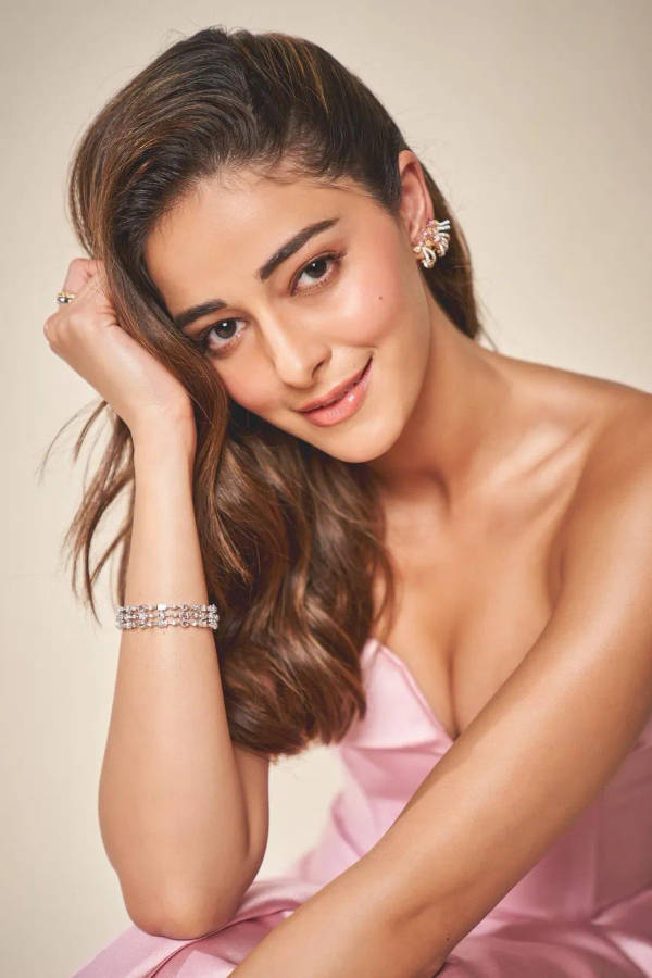 Ananya Pandey Striking A Pose With Her Hand On Her Head. Wallpaper