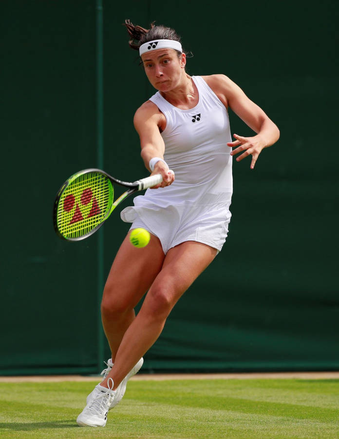 Anastasija Sevastova In Stunning All-white Tennis Outfit Wallpaper