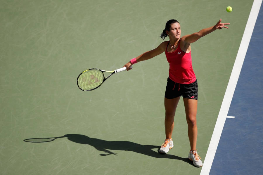 Anastasija Sevastova Preparing To Serve In Tennis Match Wallpaper