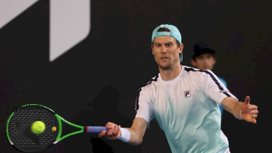 Andreas Seppi Expertly Receiving A Tennis Ball On Court Wallpaper