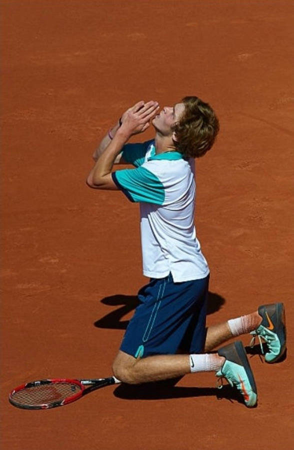 Andrey Rublev Kneeling On The Ground Wallpaper