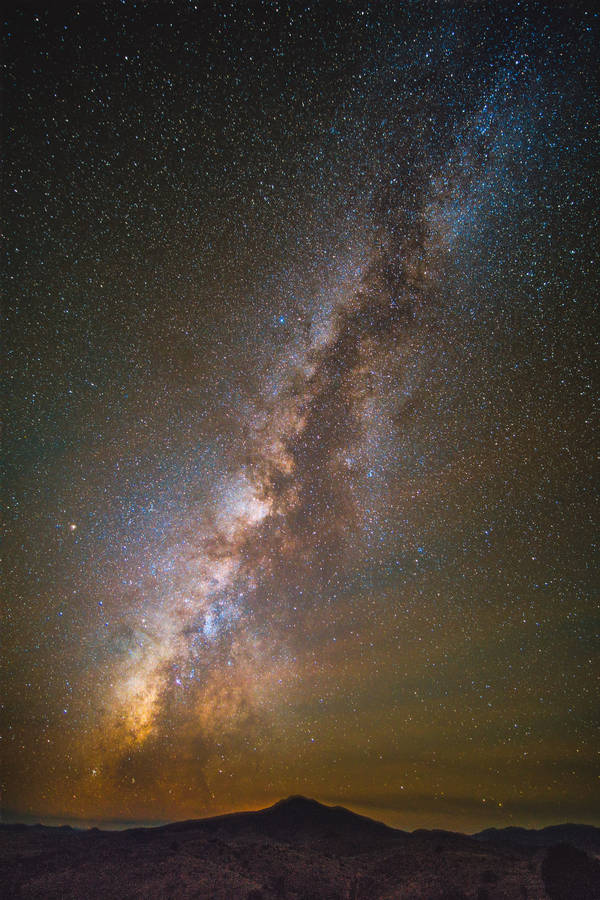 Andromeda Galaxy Over A Mountain Wallpaper