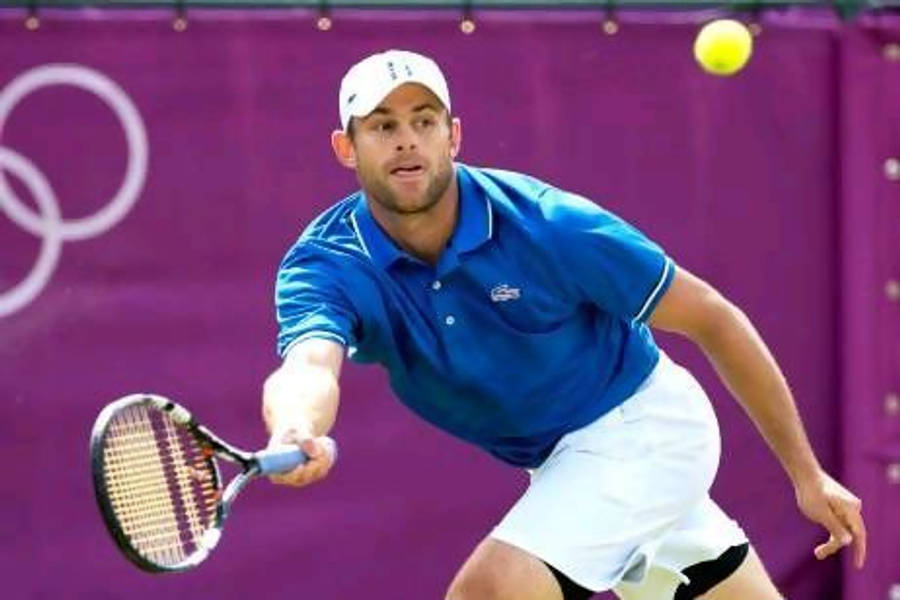 Andy Roddick In Action On The Tennis Court Wallpaper