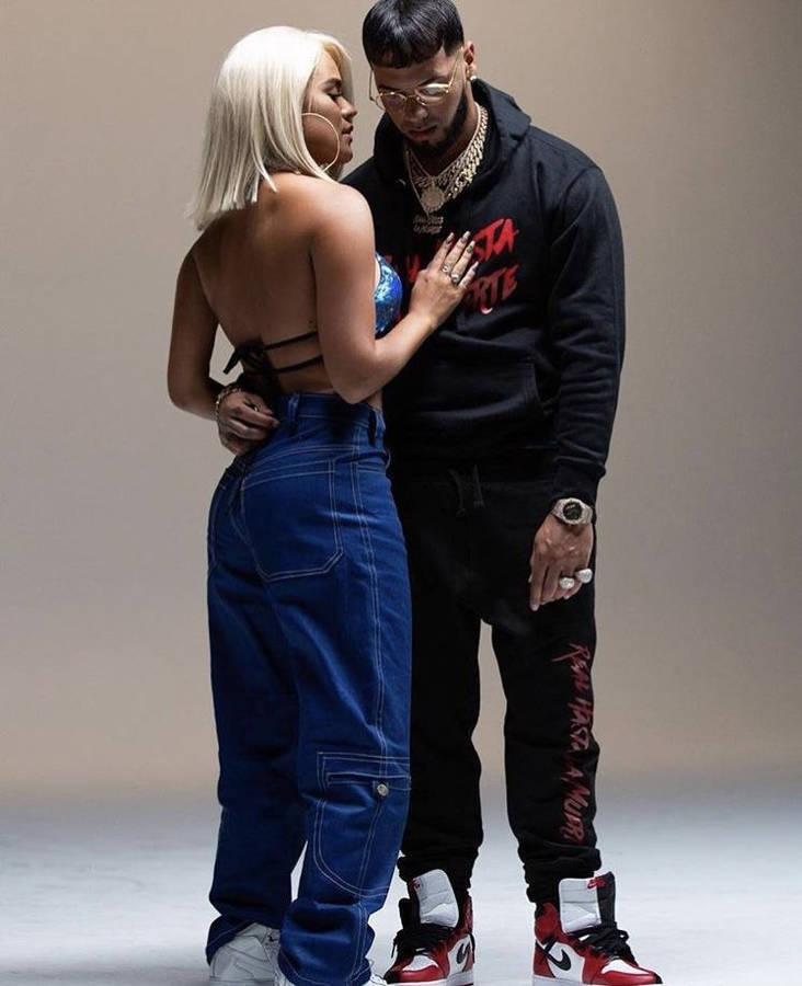 Anuel Aa Photoshoot With Carol G Wallpaper