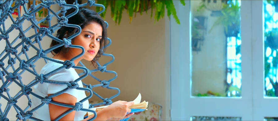 Anupama Parameswara Reading A Book Wallpaper