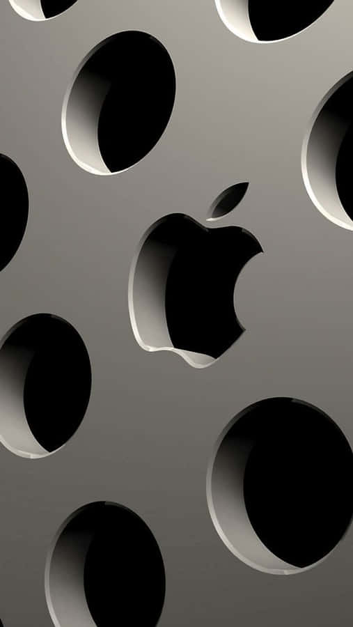 Apple Logo On A Metal Surface With Holes Wallpaper