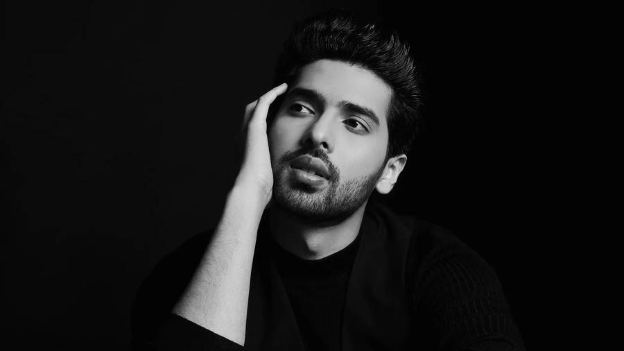 Armaan Malik Striking Monochromatic Pose Wallpaper