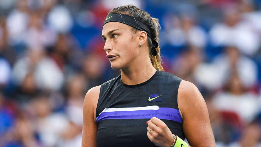 Aryna Sabalenka In Action - Tennis Pro With Black Headband Wallpaper