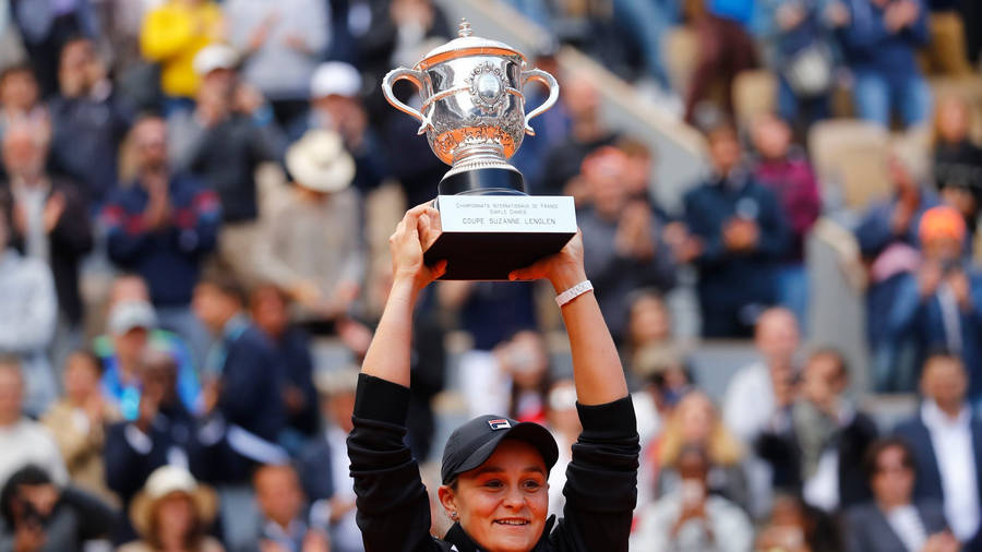 Ashleigh Barty Raising Her Trophy Wallpaper