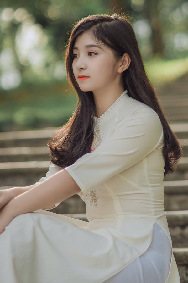 Asian Woman In Elegant White Dress Wallpaper