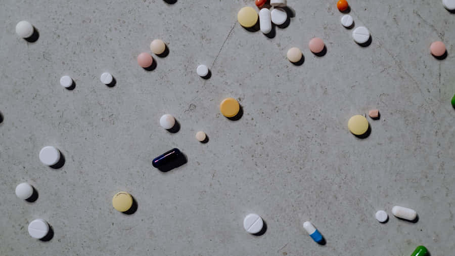 Assorted Medications Scattered Background Wallpaper