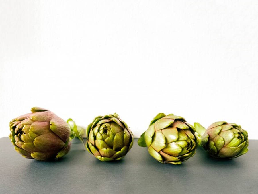 Assorted Sizes Of Fresh Artichokes Wallpaper