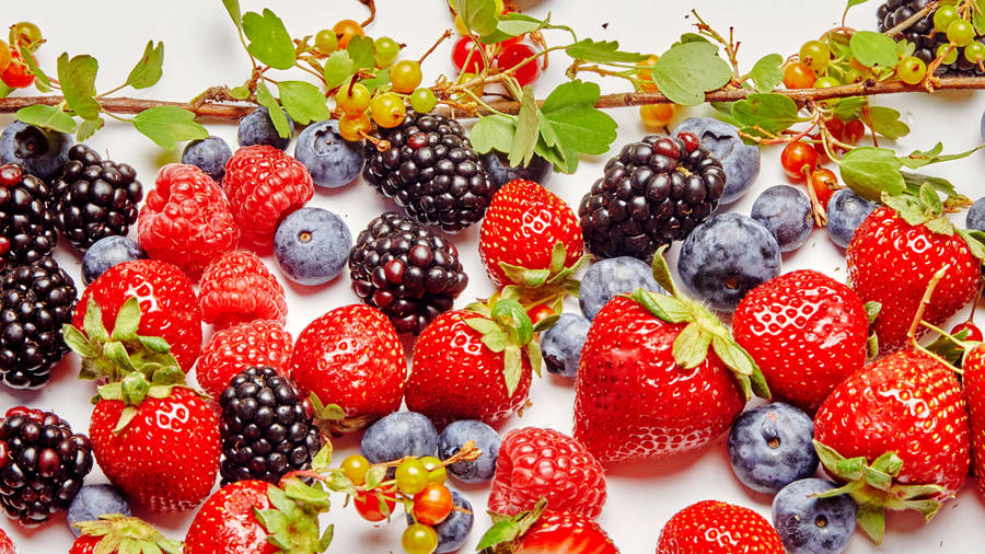 Assortment Of Vibrant, Fresh Boysenberries Wallpaper