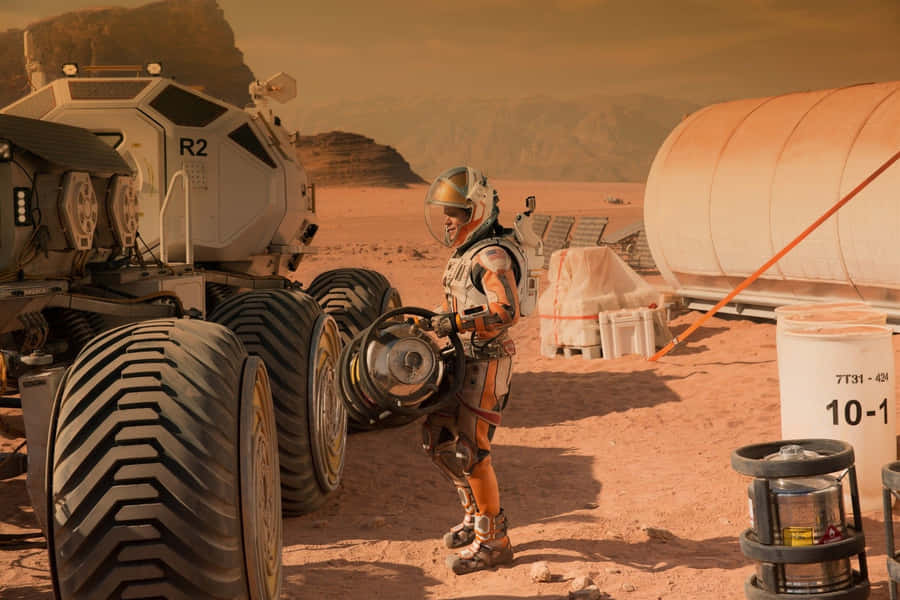 Astronaut Mark Watney Confronting Mars' Environment In The Martian Wallpaper