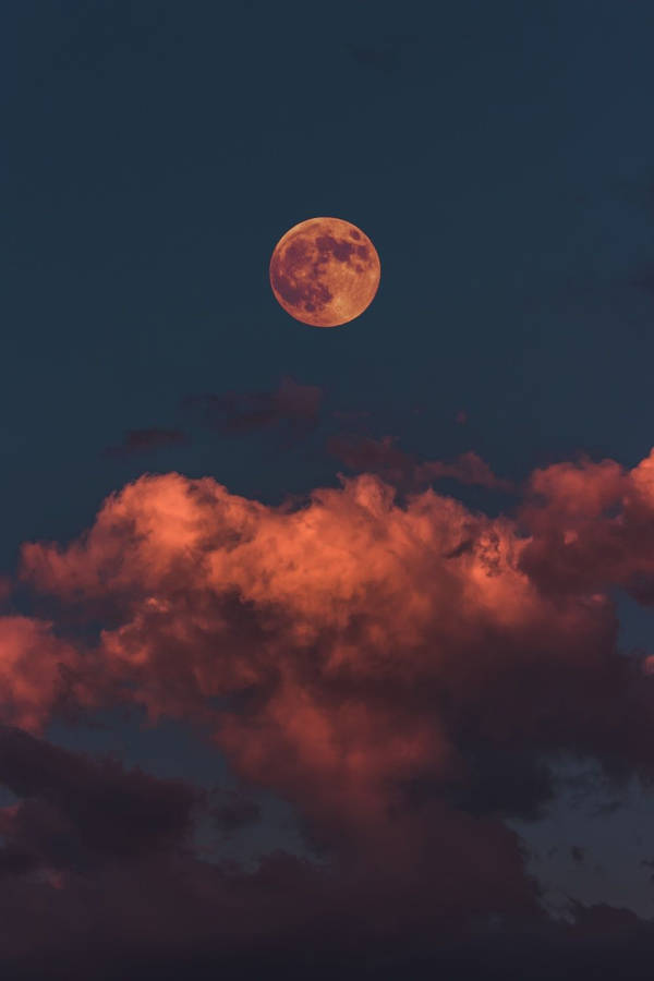 Authentic Cloudy Sky With Full Moon Wallpaper