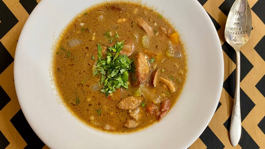 Authentic Gumbo Dish With Spoon Wallpaper