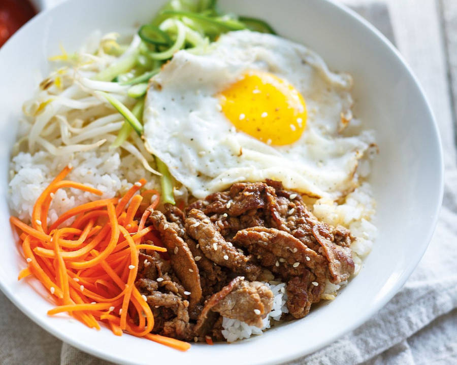 Authentic Korean Cuisine: Bibimbap With Julienne Vegetables Wallpaper