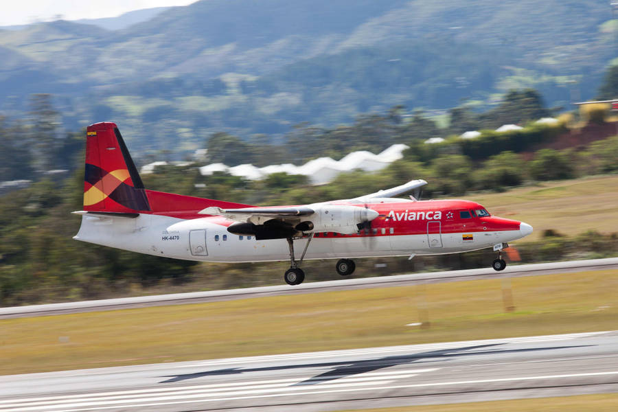 Avianca Airline Fokker 50 Aircraft Landing Shot Wallpaper