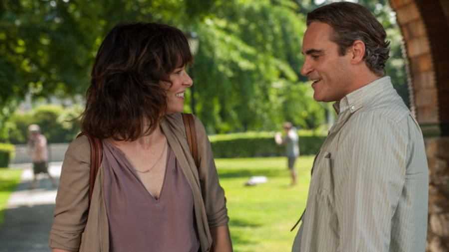 Award-winning Actress Parker Posey With Joaquin Phoenix. Wallpaper